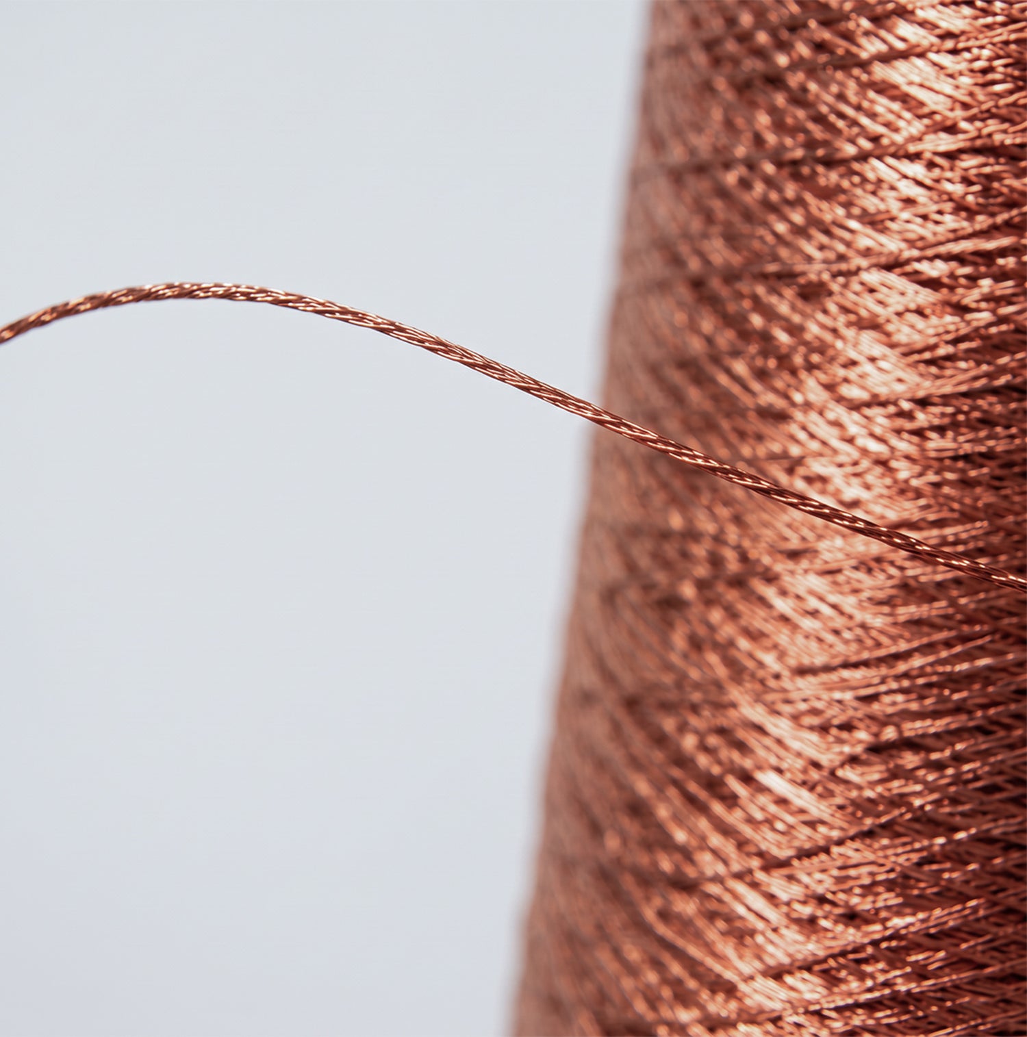ORUU's ELETEX II Conductive yarn with copper infused yarn that works on iphone.