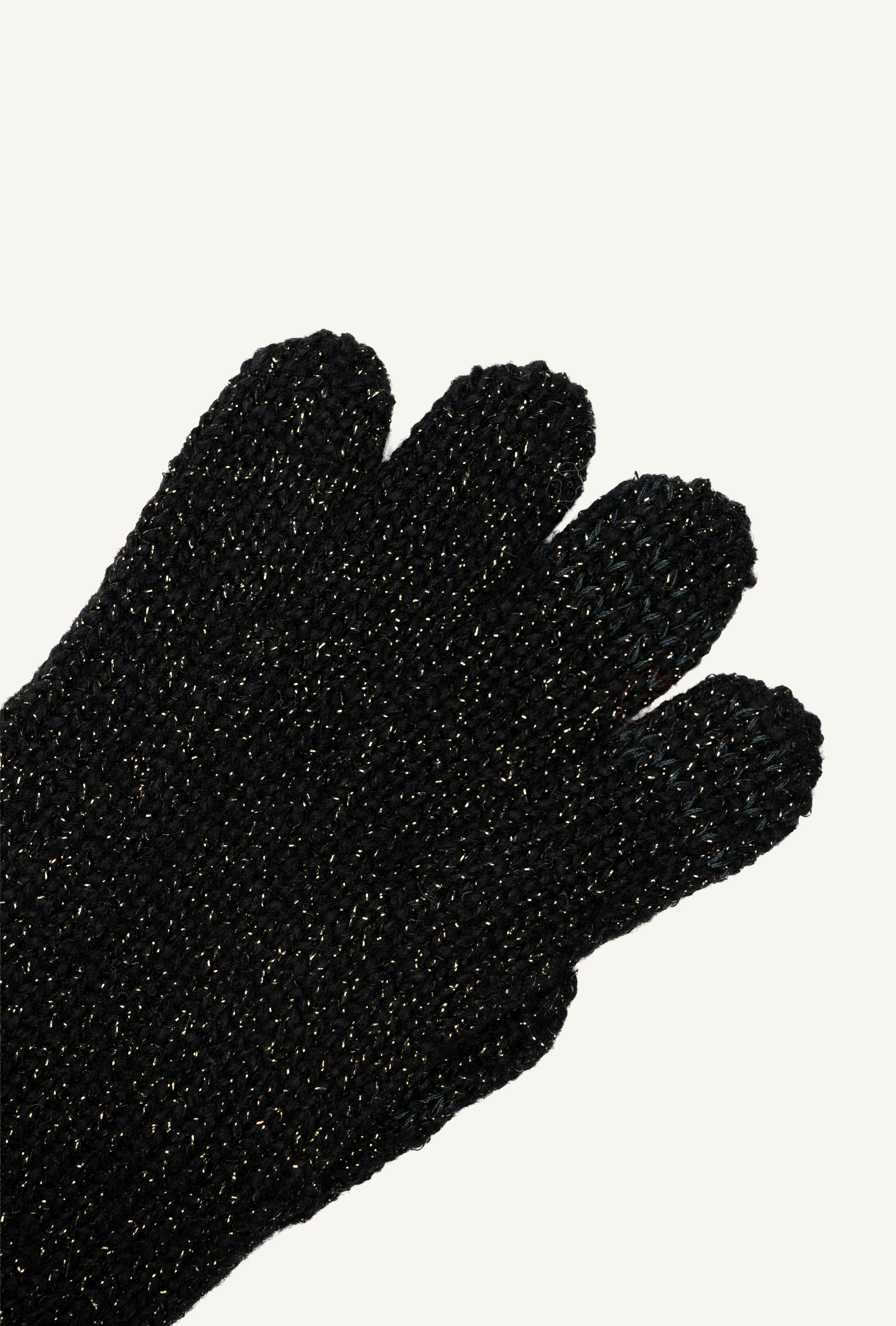 zoomed in photo of Kira Japanese touch screen gloves in black and gold lamé.