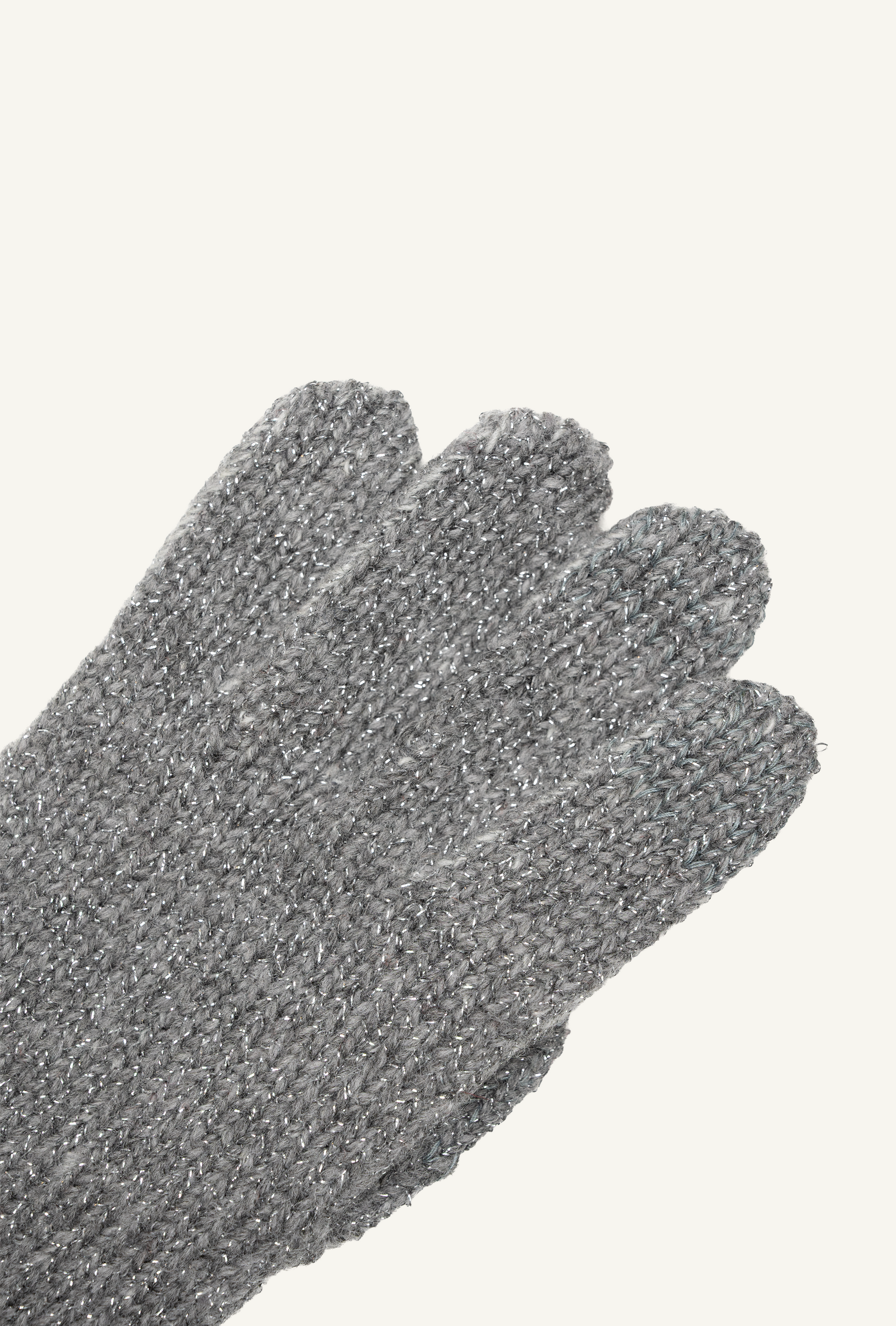 KIRA touchscreen gloves in Silver with silver lamé, close-up of the knit and Eletex II conductive fingertip